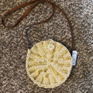 Tan & gold accented straw bag